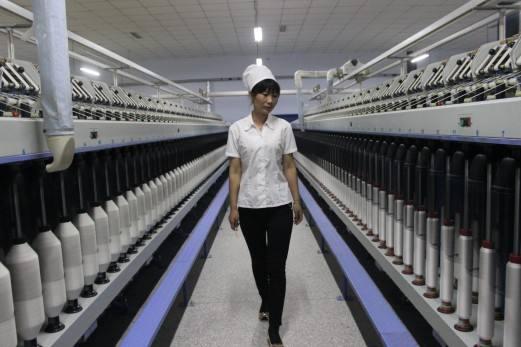 纺织企业扎堆走进新疆 “棉花+政策”激发投资热情0.jpg
